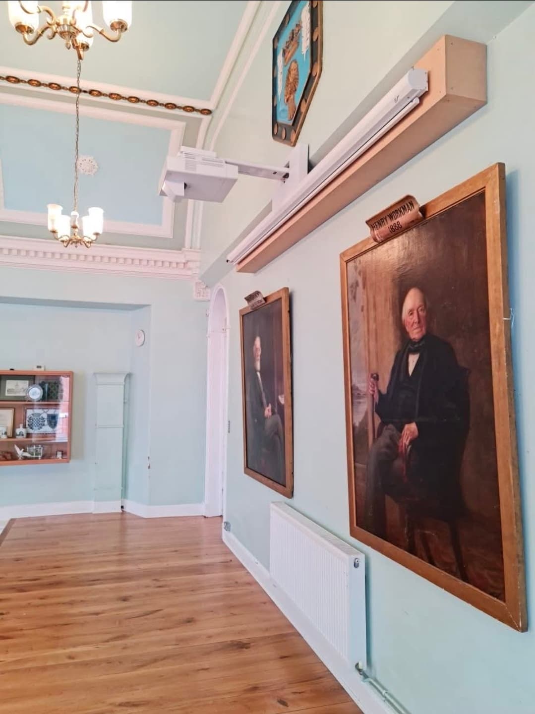 Heritage portraits lining the hall